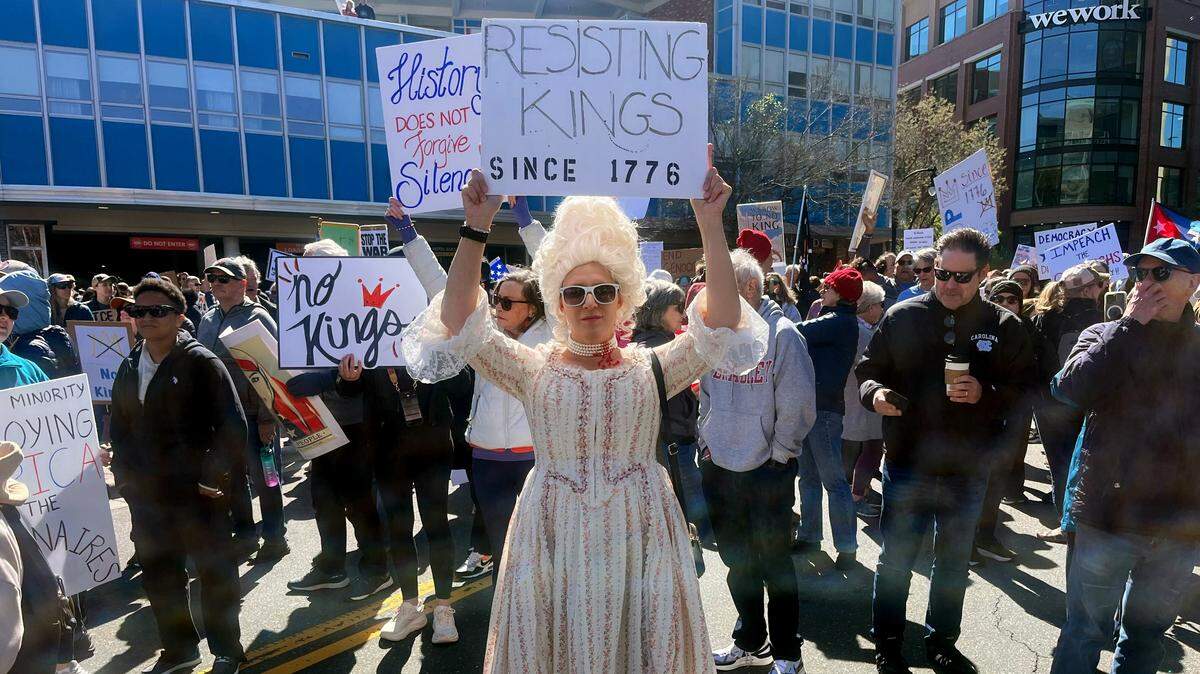 Sara Swartzwelder, visiting family in Durham from New York, dressed as Marie Antoinette, the infamous queen toppled by the French Revolution. Swartzwelder said she saw someone with the “let’s give them 1789 France” sign and thought she'd “kick it up a notch.”