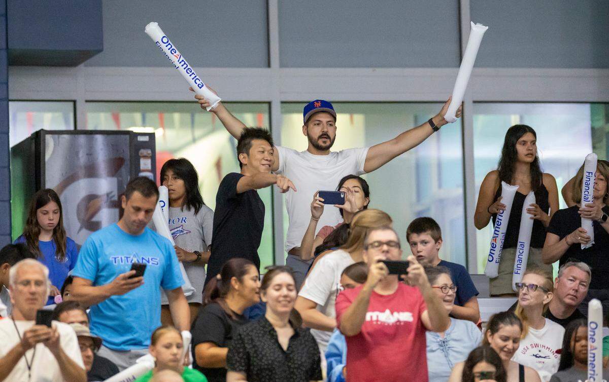 Fans welcome the 2024 Olympic Swim Team members as they arrive for practice on Saturday, July 6, 2024 at the Triangle Aquatic Center in Cary, N.C.