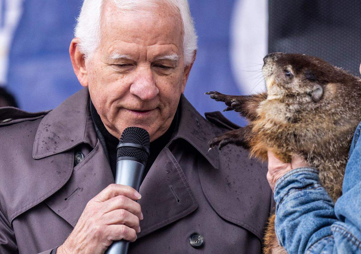 Garner Mayor Ken Marshburn says that “Snerd”, a groundhog from CLAWS Inc. Wildlife Sanctuary, predicts six more weeks of winter during a Groundhog Day event at White Deer Park in Garner Thursday, Feb. 2, 2023.