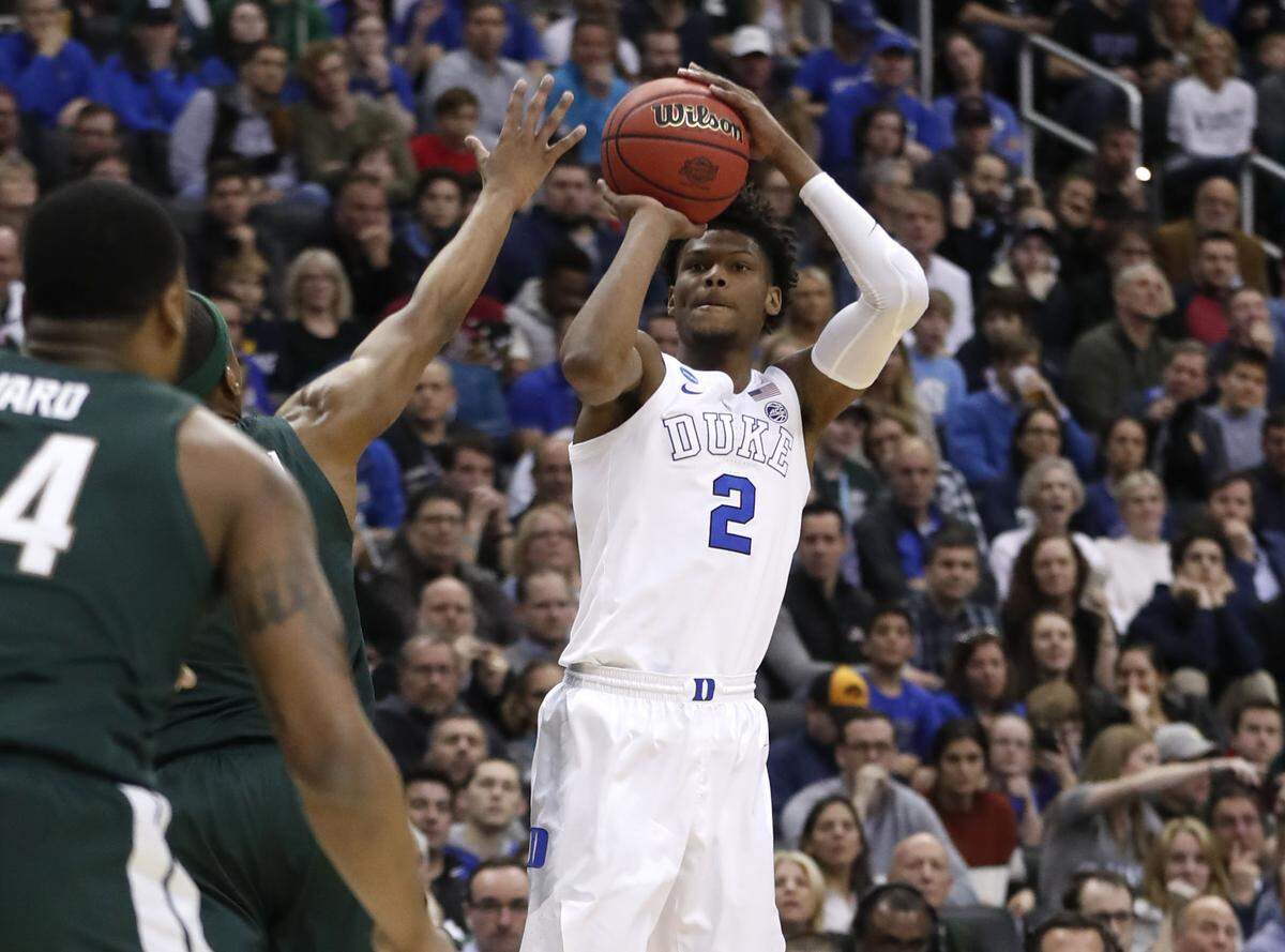Duke’s Cam Reddish (2) missed a large part of the second week of NCAA tournament games due to tendinitis, which ESPN’s Jay Bilas said he found “a little bit strange.”