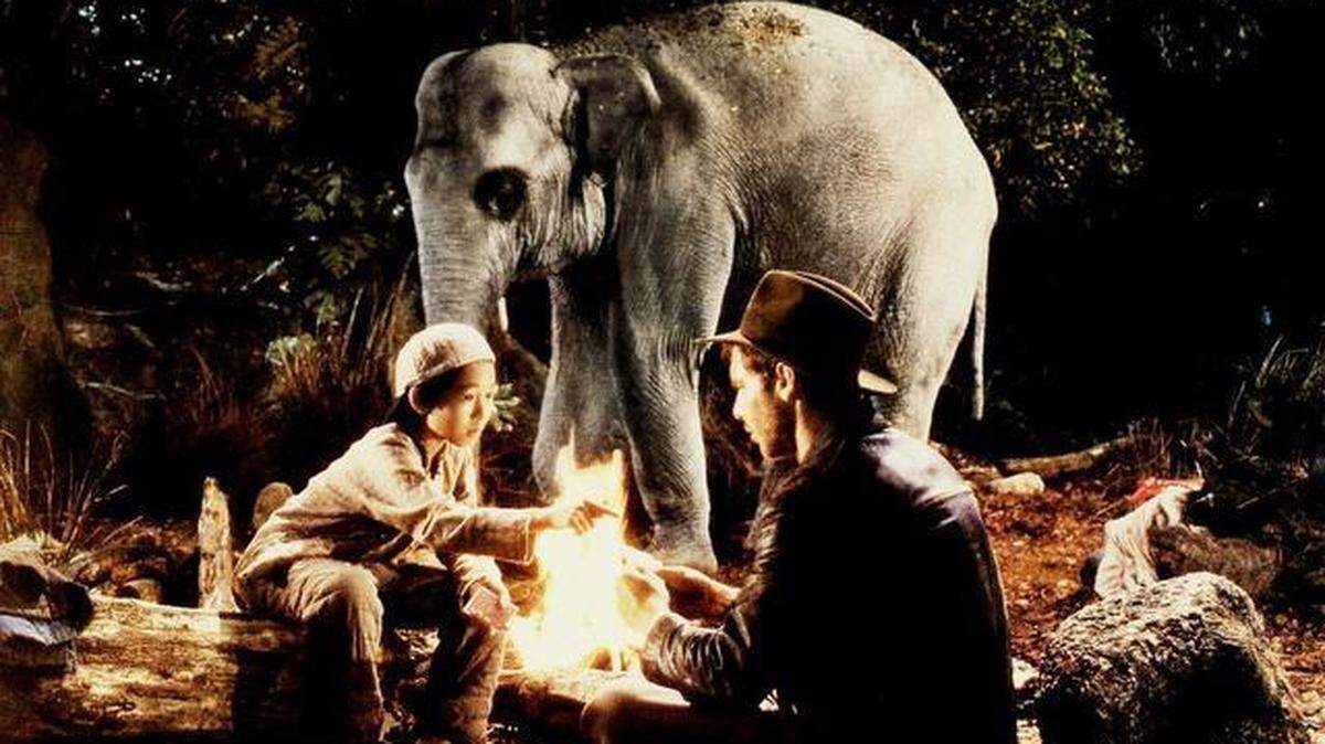 Harrison Ford, right, stars in “Indiana Jones and the Temple of Doom,” released in 1984.