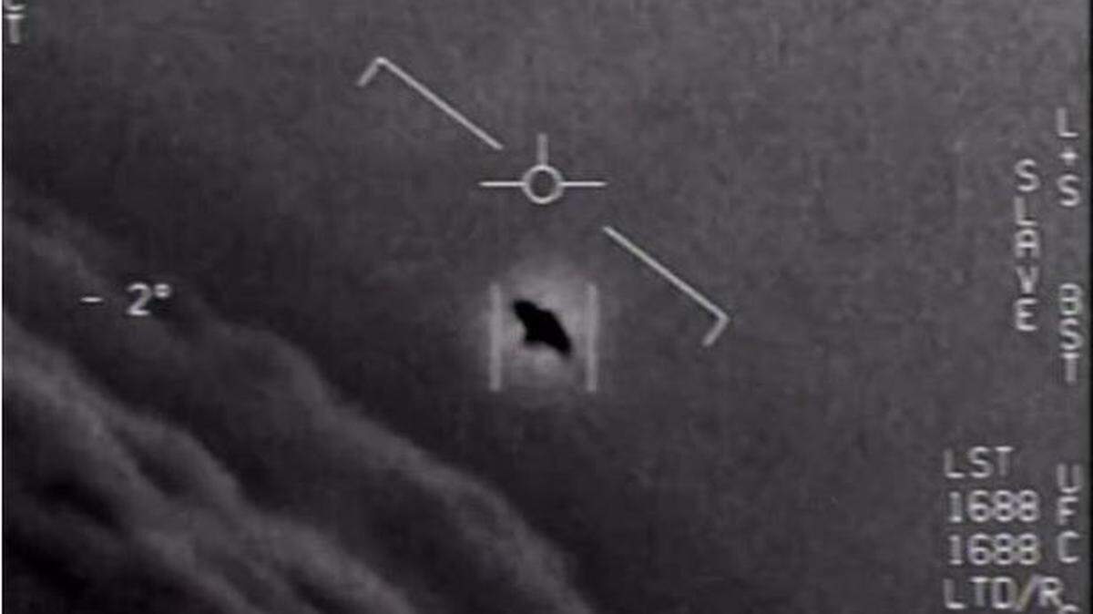 An image from a video released by The US Department of Defense shows a purported encounter with an unidentified flying object (UFO).