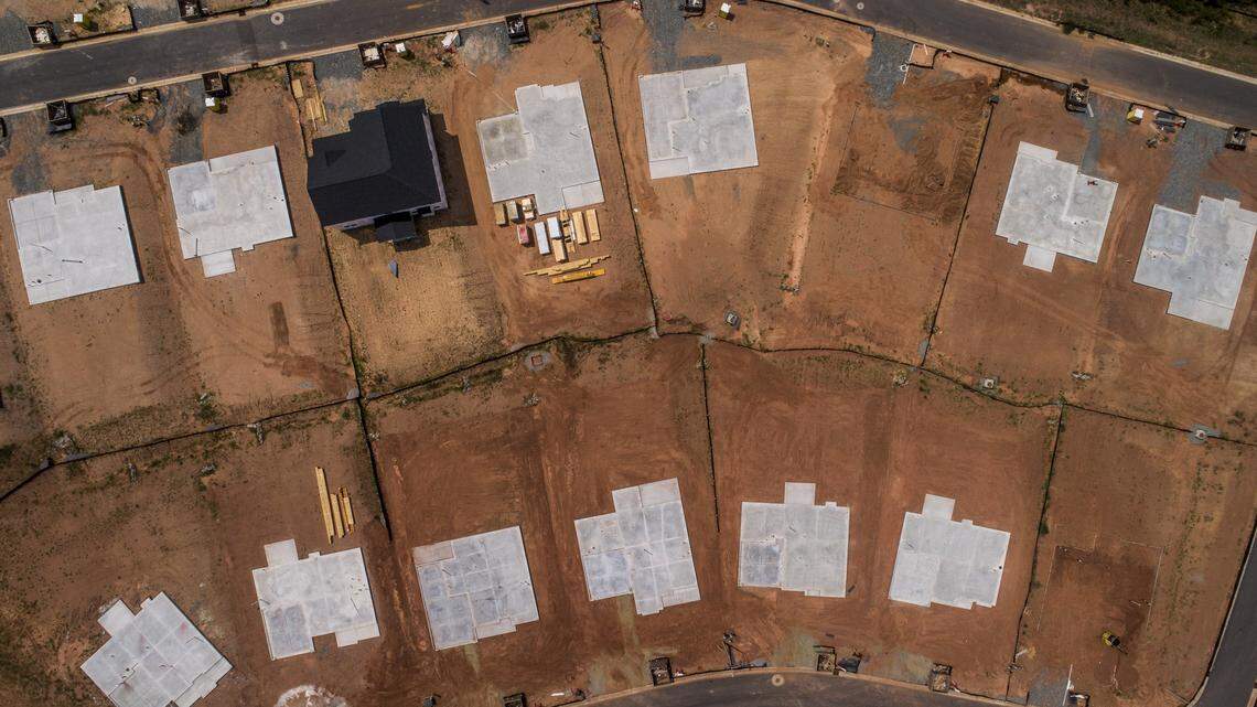 New construction is underway Friday, Aug.13, 2021 at the Bridgeberry subdivision in Holly Springs.