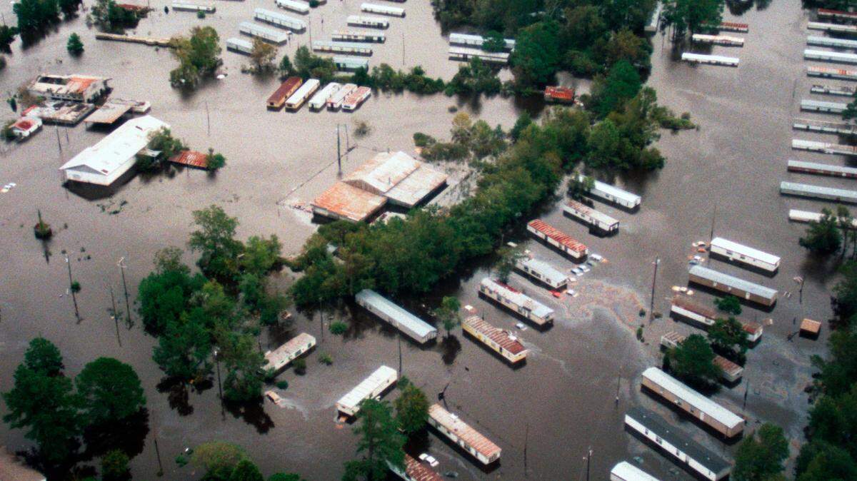 A 1999 photo shows Princeville, North Carolina, submerged under several feet of floodwater from the Tar River following Hurricane Floyd.