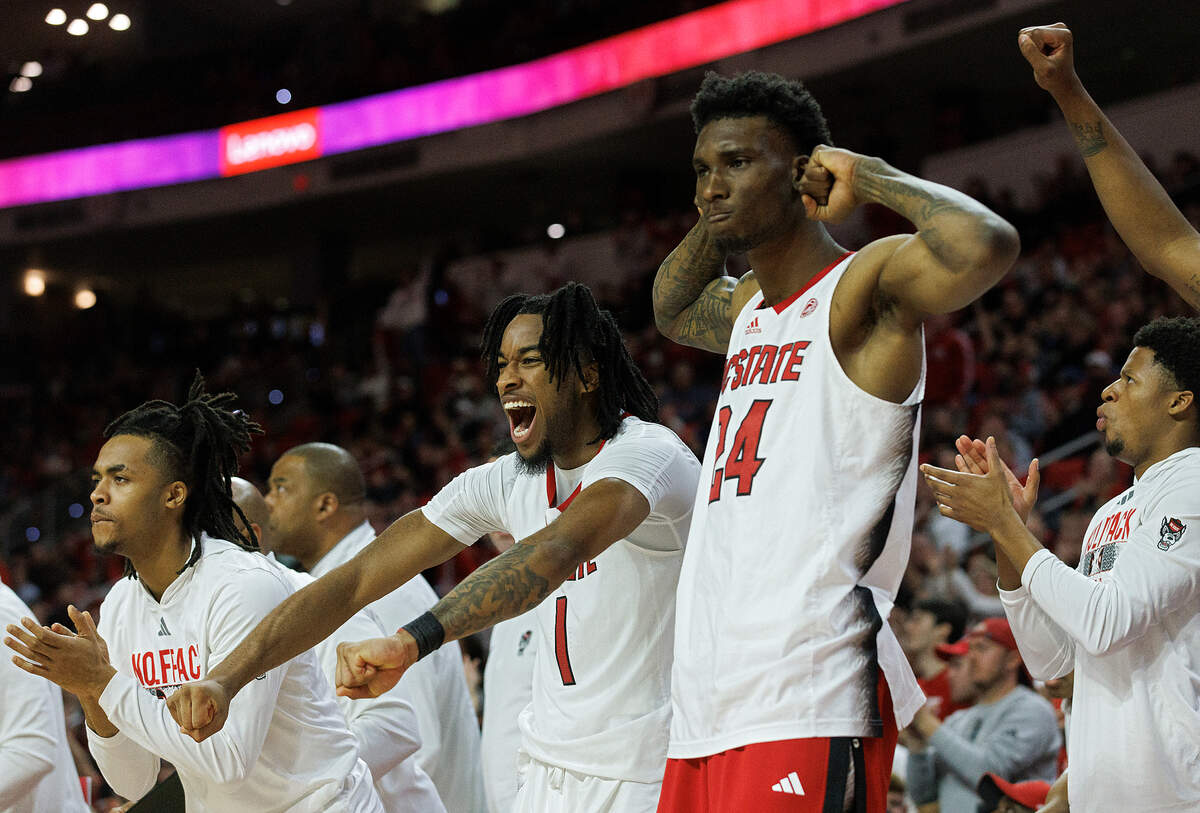 The N.C. State bench reacts following a made basket by Ben Middlebrooks during the second half of the Wolfpack’s 83-76 win over Wake Forest at PNC Arena on Tuesday, Jan. 16, 2024, in Raleigh, N.C.