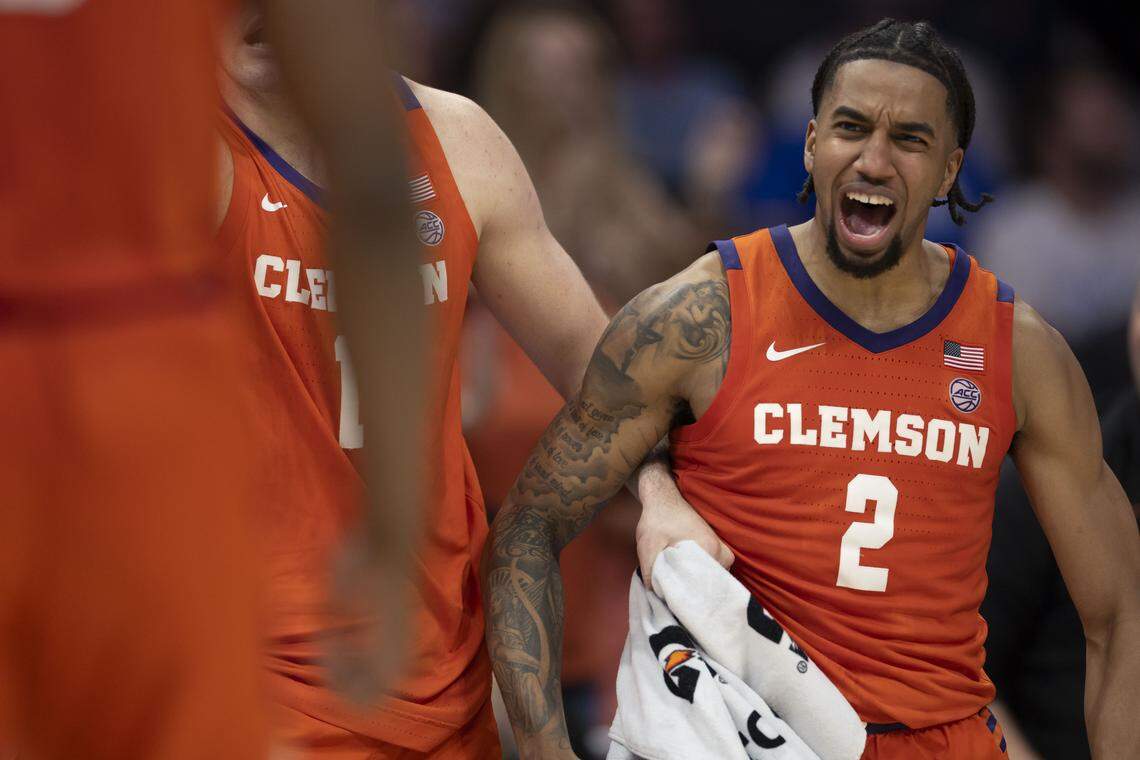 Clemson guard Dillon Hunter (2) react as the Tigers take a 58-41 lead over North Carolina in the second half on Thursday, March 12, 2026, during the quarterfinals of the ACC Tournament at Spectrum Center in Charlotte, N.C.