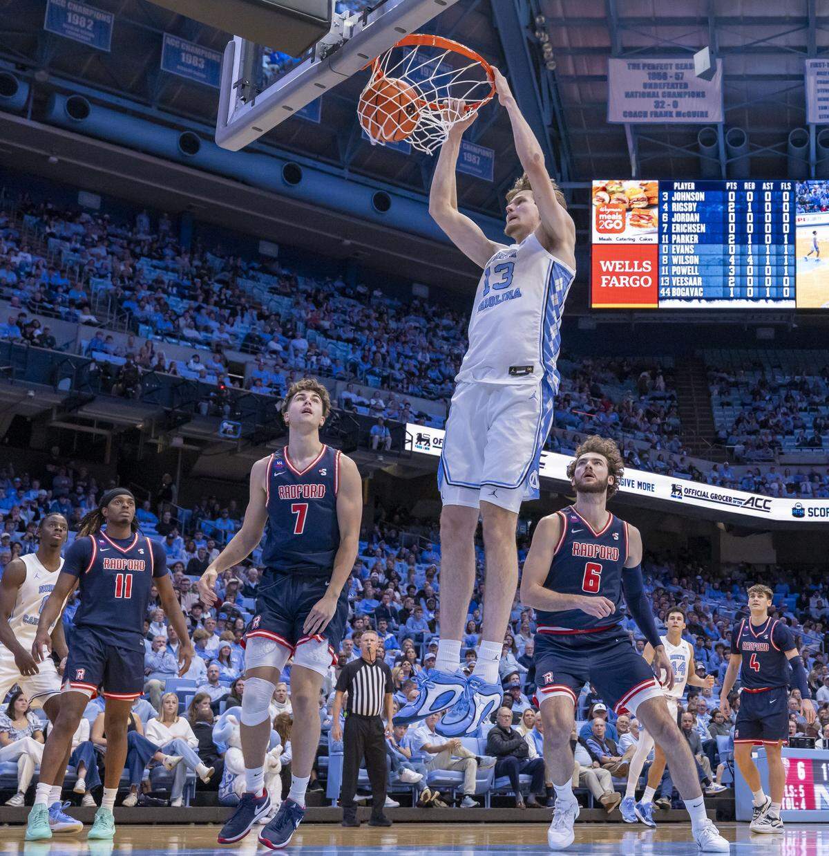 North Carolina center Henri Veesaar (13) dunks over Radford forwards Frederik Erichsen (7) and Louie Jordan (6) in the first first on Tuesday, November 11, 2025 at the Smith Center in Chapel Hill, N.C.