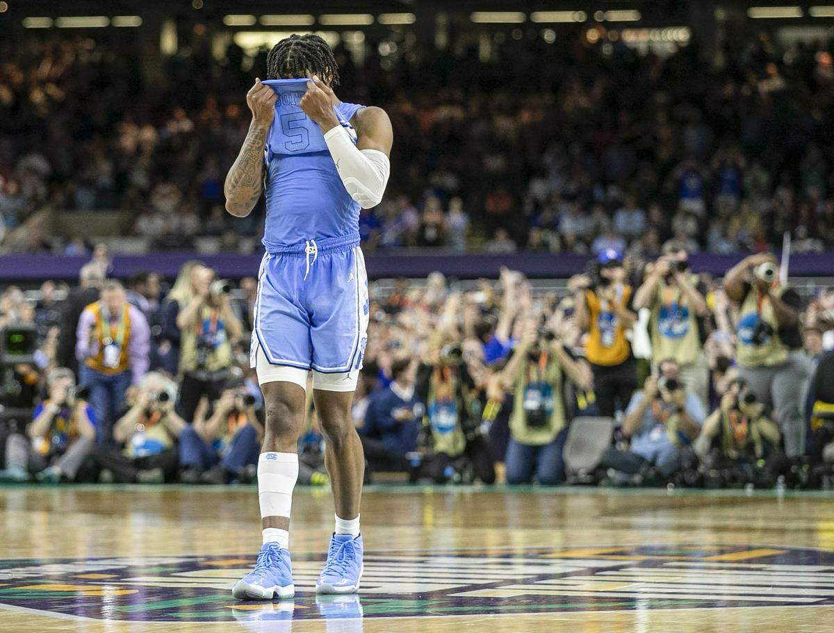 North Carolina’s Caleb Love (2) reacts after missing a three-point shot with 2.1 seconds to play to secure a 72-69 victory for Kansas during the NCAA Championship game on Monday, April 4, 2022 at Caesars Superdome in New Orleans, La.