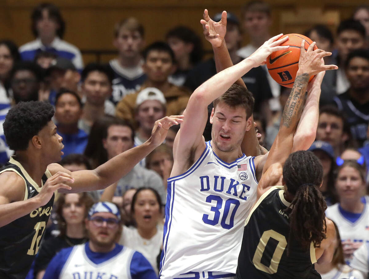 Duke’s Kyle Filipowski pulls down a defensive rebound during the second half of the Blue Devils’ 109-64 exhibition win over UNC Pembroke on Wednesday, Nov. 1, 2023, at Cameron Indoor Stadium in Durham, N.C.