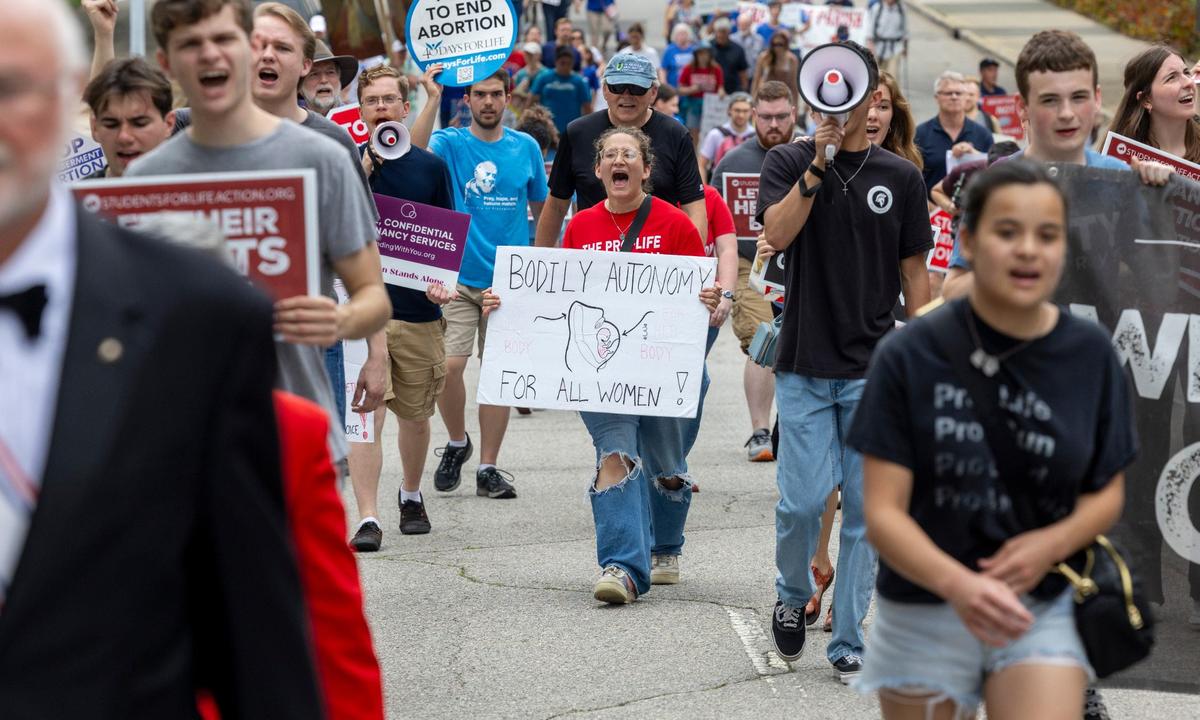 Several hundred Pro-Life advocates from across North Carolina march around the General Assembly following their rally on Saturday, May 18, 2024 in Raleigh, N.C