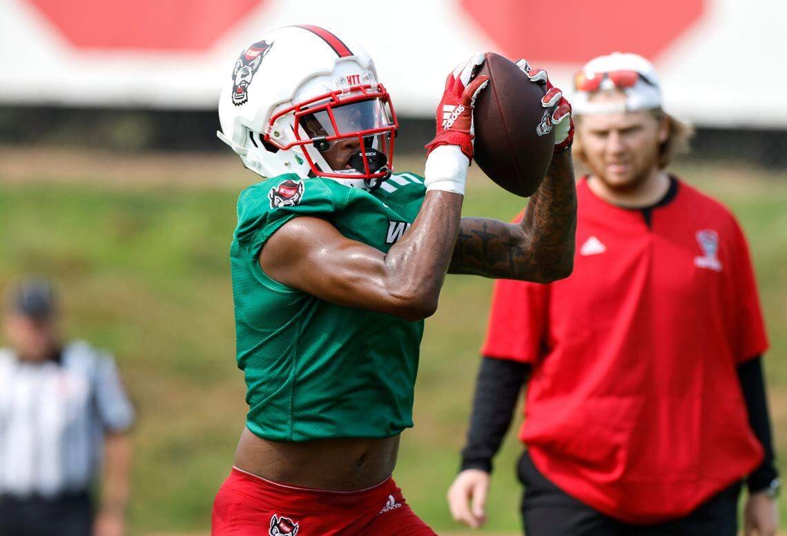 N.C. State wide receiver DJ Collins (86) pulls in a pass during the Wolfpack’s first fall practice in Raleigh, N.C., Wednesday, August 2, 2023.
