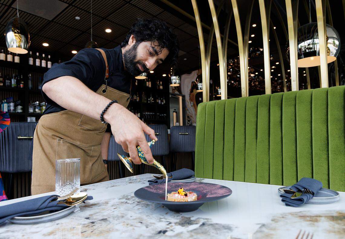 Executive chef Bhavin Chhatwani prepares a “North Meets South” dessert at Tamasha Modern Indian on Wednesday, May 8, 2024, in Raleigh, N.C.