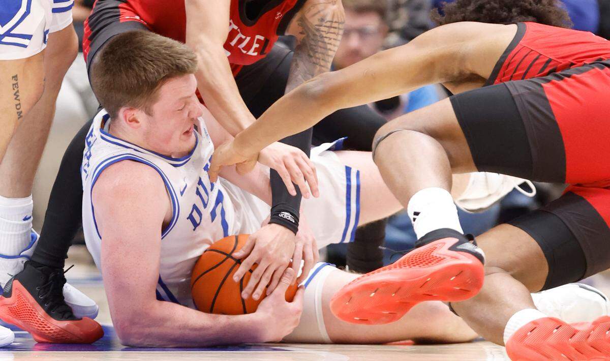 Duke’s Kon Knueppel (7) pulls in the loose ball during the first half of Duke’s game against Seattle at Cameron Indoor Stadium in Durham, N.C., Friday, Nov. 29, 2024.