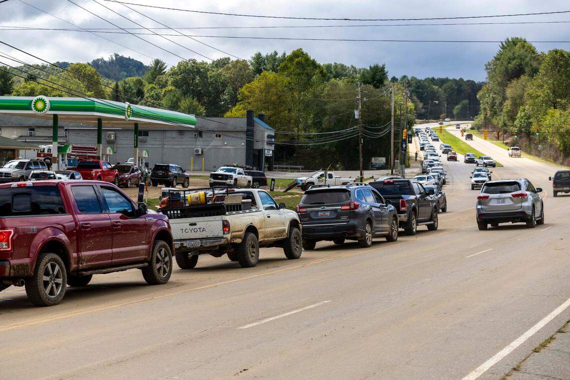 Dozens of vehicles wait in line for gas in Clyde on Saturday, Sept. 28, 2024 as the remnants of Hurricane Helene caused flooding, downed trees, and power outages in western North Carolina.