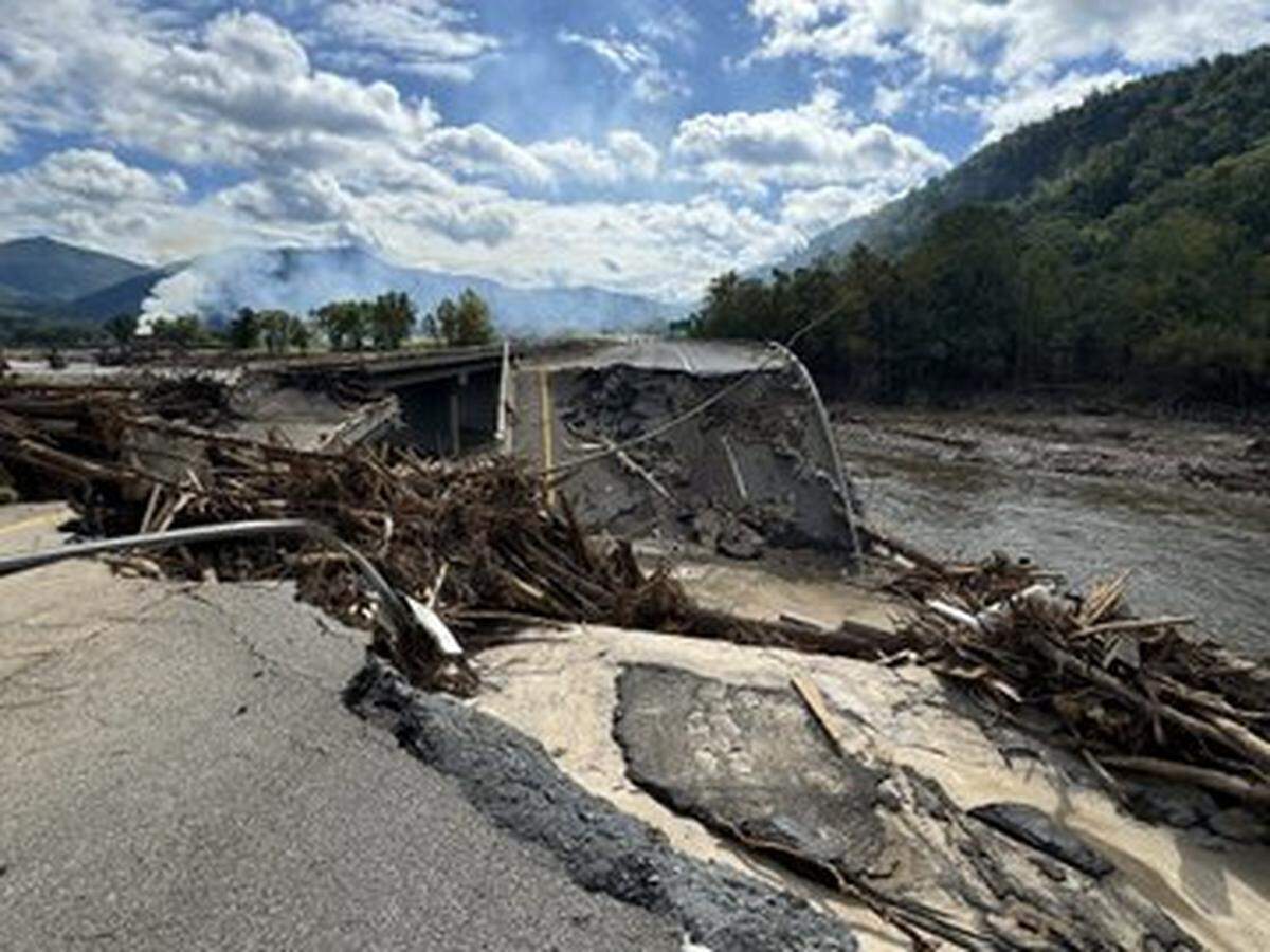 The flooding Nolichucky River knocked down twin spans of Interstate 26 in Erwin, Tennessee, after the remnants of Hurricane Helene dumped historic amounts of rain on the Blue Ridge Mountains. It’s not clear how long the highway will be closed.