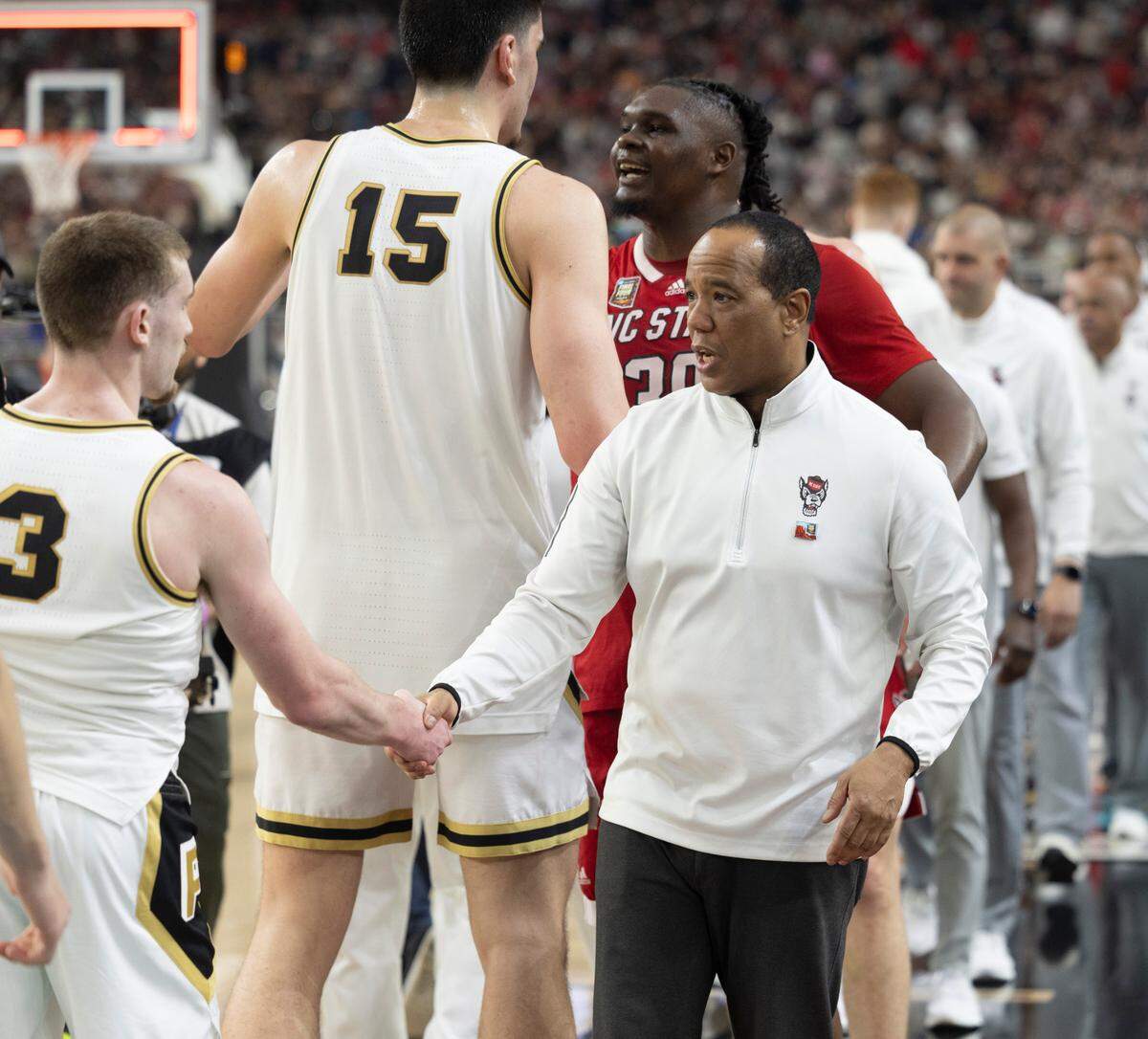 N.C. State coach Kevin Keatts congratulate Purdue’s Braden Smith (3) following their 63-50 victory following the NCAA Final Four National Semifinal game on Saturday, April 6, 2024 at State Farm Stadium in Glendale, AZ.