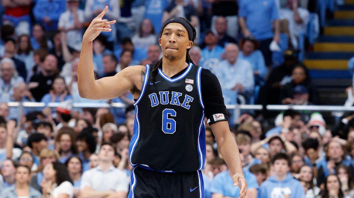 Duke’s Maliq Brown (6) celebrates hitting a three-pointer in the second half of Duke’s 82-69 victory over UNC at the Smith Center in Chapel Hill, N.C., Saturday, March 8, 2025.