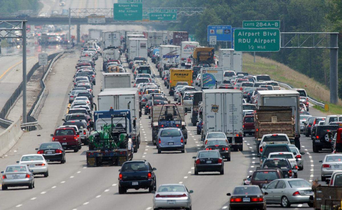 Car and commercial truck traffic backs up on I-40 near the Raleigh-Durham International Airport.