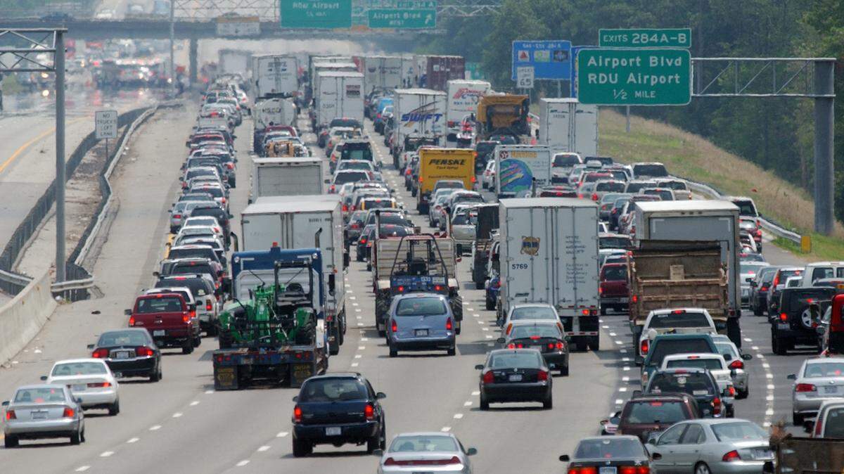 Car and commercial truck traffic backs up on I-40 near the Raleigh-Durham International Airport.