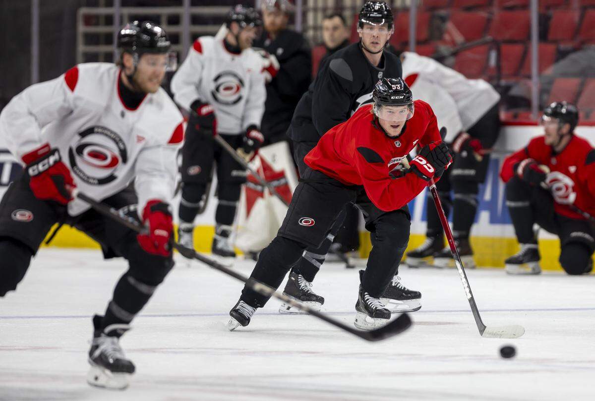 Carolina Hurricanes right wing Jackson Blake (53) skates to the puck, during practice on Tuesday, May 12, 2026, at Lenovo Center in Raleigh, N.C.