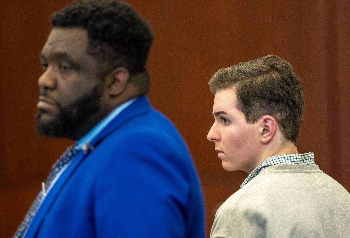 Austin Thompson, stands with his legal counsel during a hearing before Judge Paul Ridgeway on Friday, January 10, 2025 at the Wake County Justice Center in Raleigh, N.C. Thompson is accused in the deadly 2022 shootings in Raleigh’s Hedingham neighborhood.