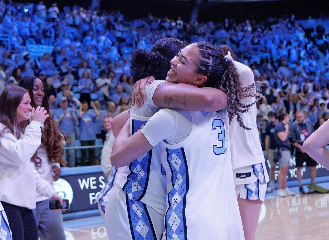 North Carolina’s Nyla Harris and Taliyah Henderson celebrate following the Tar Heels’ 74-69 win over Duke on Sunday, March 1, 2026, at Carmichael Arena in Chapel Hill, N.C.