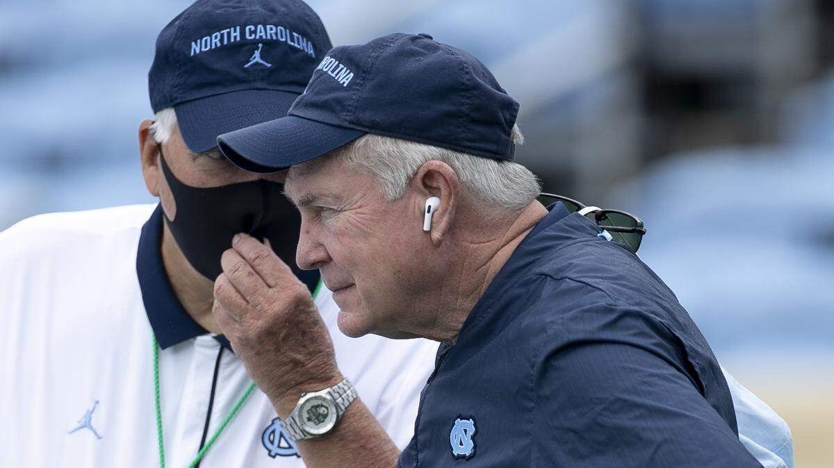 North Carolina head coach Mack Brown confers with Ken Browning on Saturday, September 12, 2020 at Kenan Stadium in Chapel Hill, N.C.