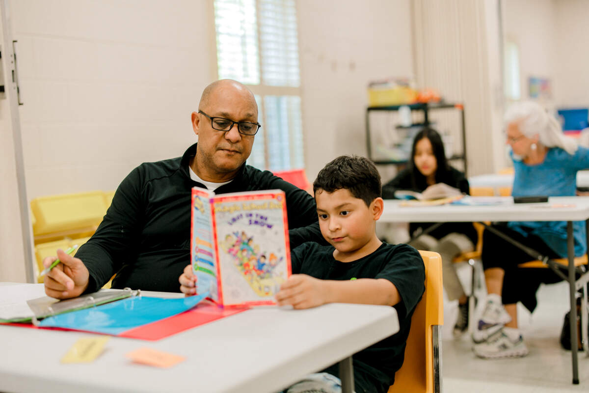 Daniel D’Oleo mentors Christian Montufar at Neighbor to Neighbor’s Aprendo program in Raleigh, N.C. in this September 2023 photo.