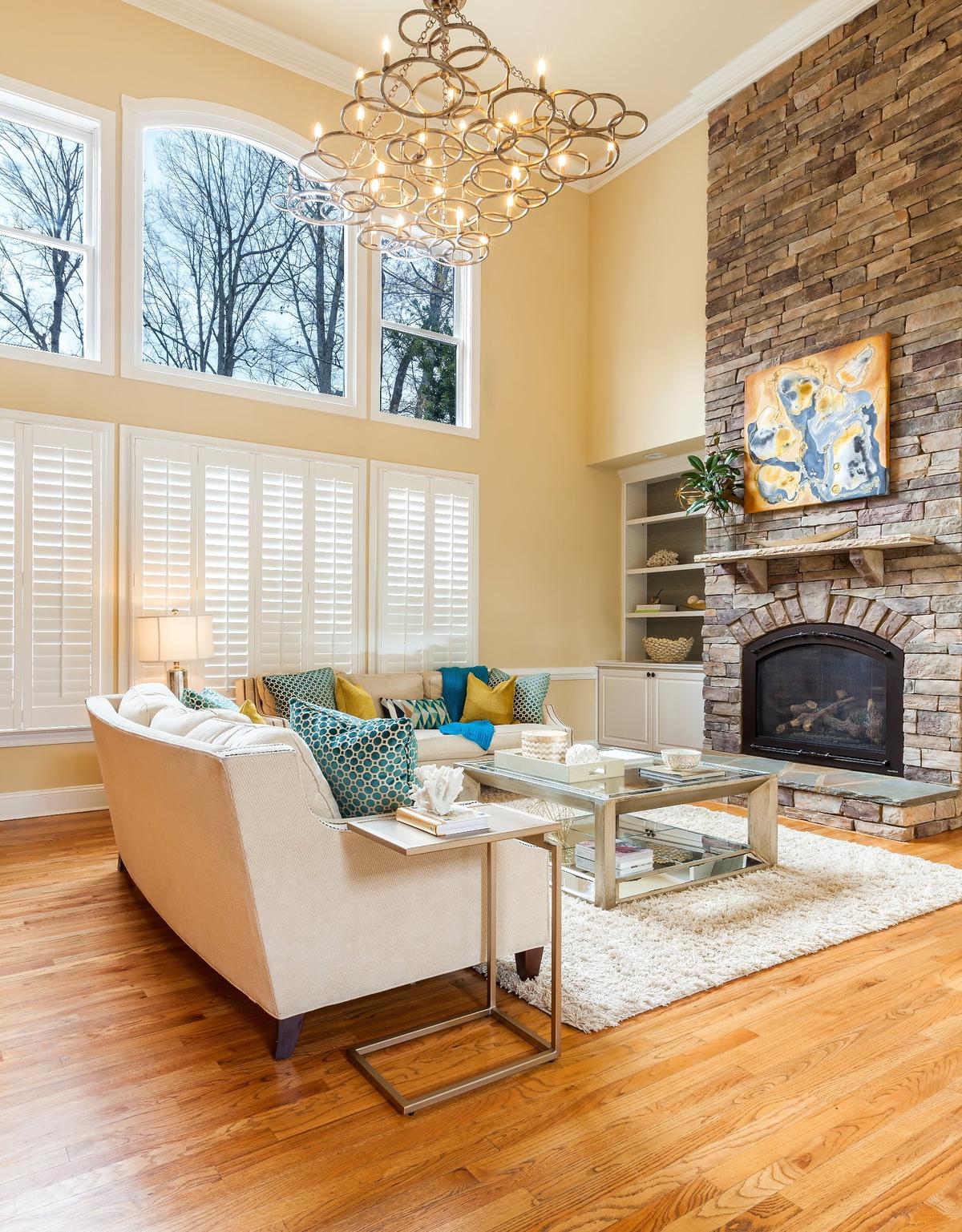 The striking chandelier creates a focal point, adds much needed lighting and gives the space style and sophistication.