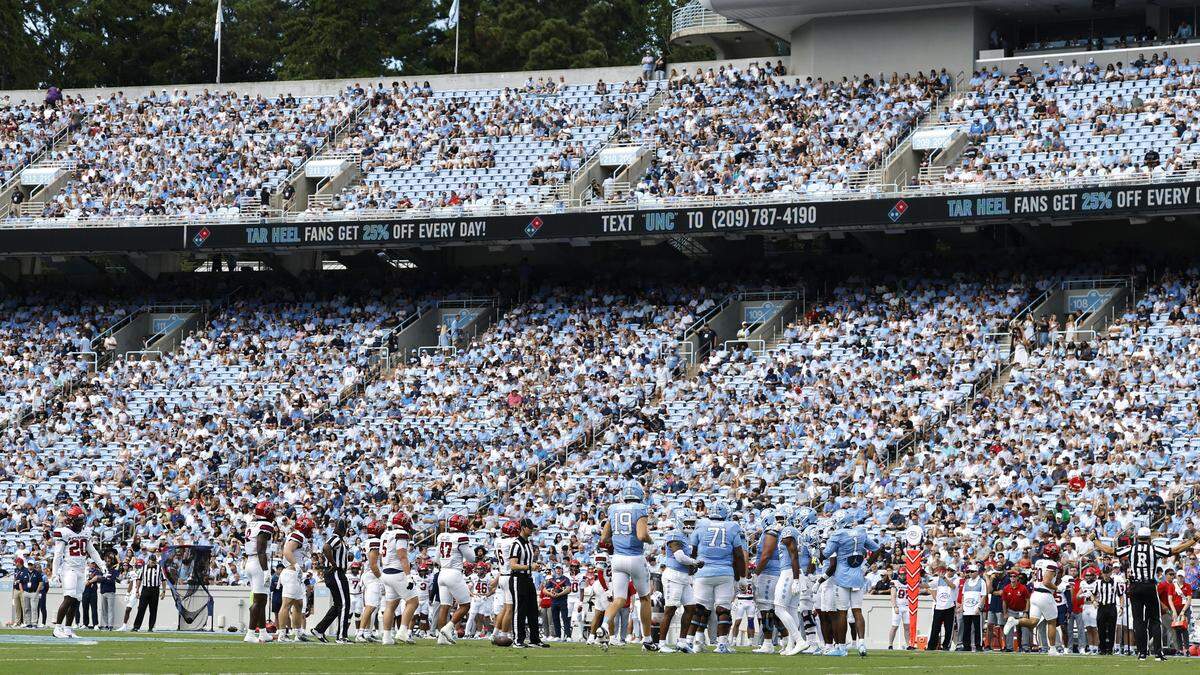 Players come onto the field after a timeout during the first half of UNC’s game against Richmond at Kenan Stadium in Chapel Hill, N.C., Saturday, Sept. 13, 2025.