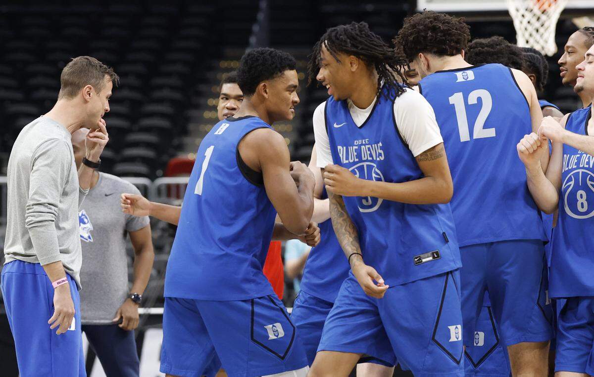 Duke’s Caleb Foster bumps Isaiah Evans during Duke’s practice at Capital One Arena in Washington, D.C., Thursday, March 26, 2026. The Blue Devils face St. John’s in the Sweet 16 of the NCAA Men’s Basketball East Regional Friday.