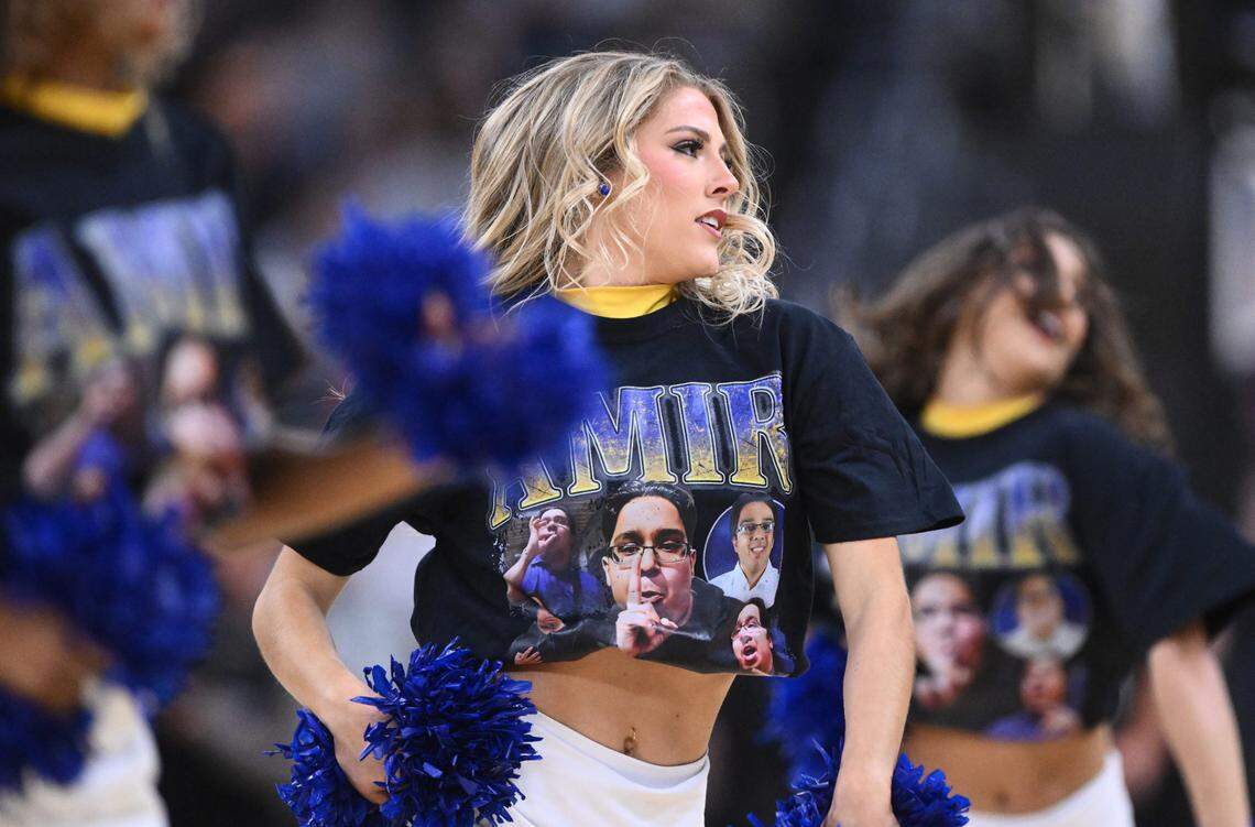 Mar 22, 2025; Providence, RI, USA; McNeese State Cowboys cheerleaders wear shirts for McNeese State Cowboys manager Amir Khan (not pictured) during the first half of a second round men’s NCAA Tournament game against the Purdue Boilermakers at Amica Mutual Pavilion. Mandatory Credit: Brian Fluharty-Imagn Images