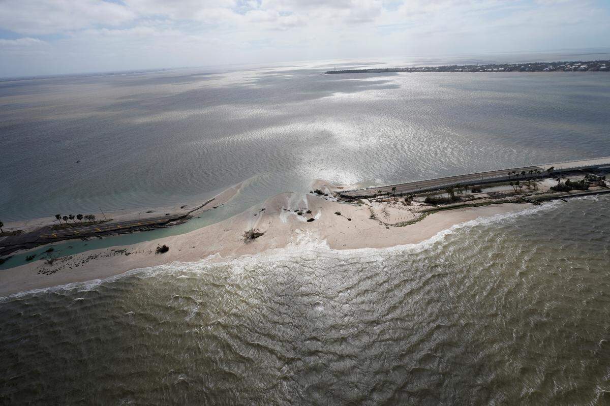 A damaged causeway to Sanibel Island is seen in the aftermath of Hurricane Ian , Thursday, Sept. 29, 2022, near Sanibel Island, Fla.