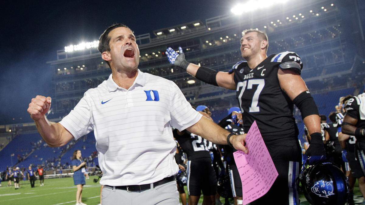 Duke head coach Manny Diaz celebrates following the Blue Devils’ 45-33 win over N.C. State on Saturday, Sept. 20, 2025, at Wallace Wade Stadium in Durham, N.C.