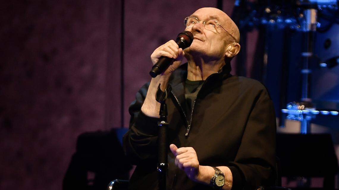 Phil Collins performs with Genesis in concert as they bring their “Last Domino Tour” to Raleigh, N.C.’s PNC Arena, Friday night, Nov. 19. 2021.