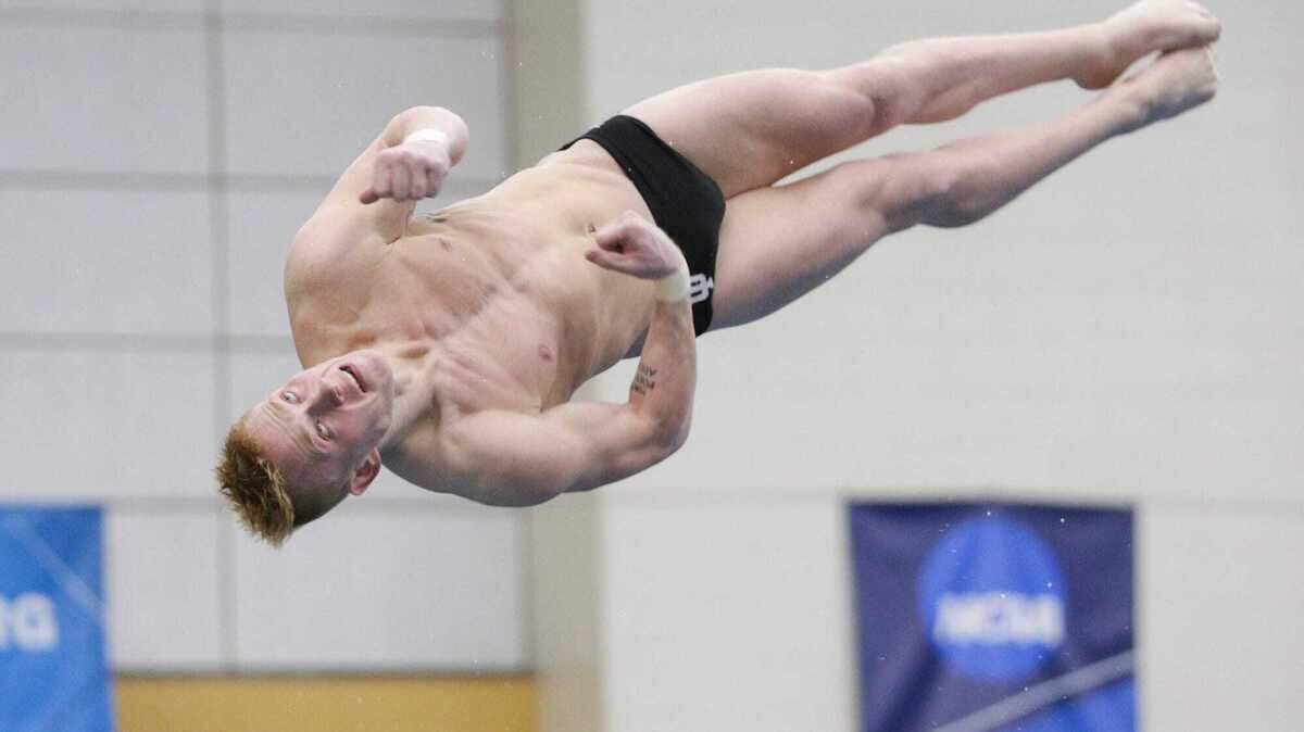 Indiana’s Andrew Capobianco competes in the one meter dive during the second day of the 2022 Big Ten Men’s Swimming Championship, Thursday, Feb. 24, 2022 at Morgan J. Burke Aquatic Center in West Lafayette, Indiana.