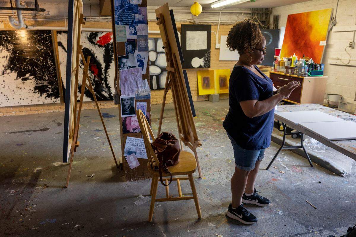 Dawn Taylor works in her studio at Artistically Speaking on Tuesday, April 26, 2022 in Durham, N.C.