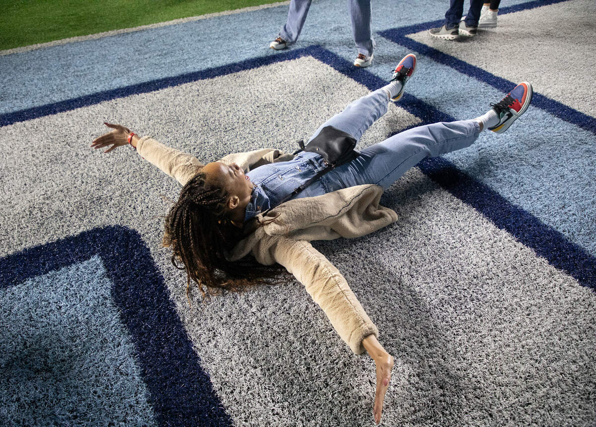 UNC-Chapel Hill alumna Alystia Moore celebrates in the end zone after the Tar Heels defeated Duke 47-45 in double overtime on Saturday, Nov. 11, 2023, at Kenan Stadium in Chapel Hill, N.C.