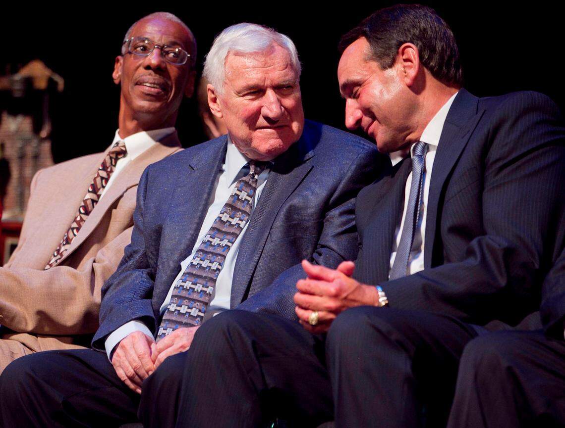 Duke coach Mike Krzyzewski acknowledges former UNC coach Dean Smith as he is honored with the Dr. James A. Naismith Good Sportsmanship Award on Wednesday June 29, 2011 at Memorial Auditorium in Raleigh, N.C.