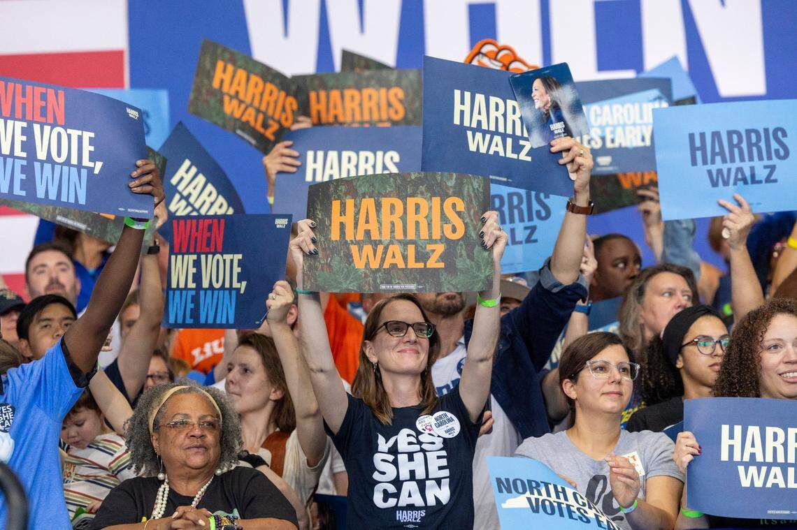 Supporters cheer on Vice President Kamala Harris as she speaks speaks during a rally at Coastal Credit Union Music Park at Walnut Creek in Raleigh on Wednesday, Oct. 30, 2024.