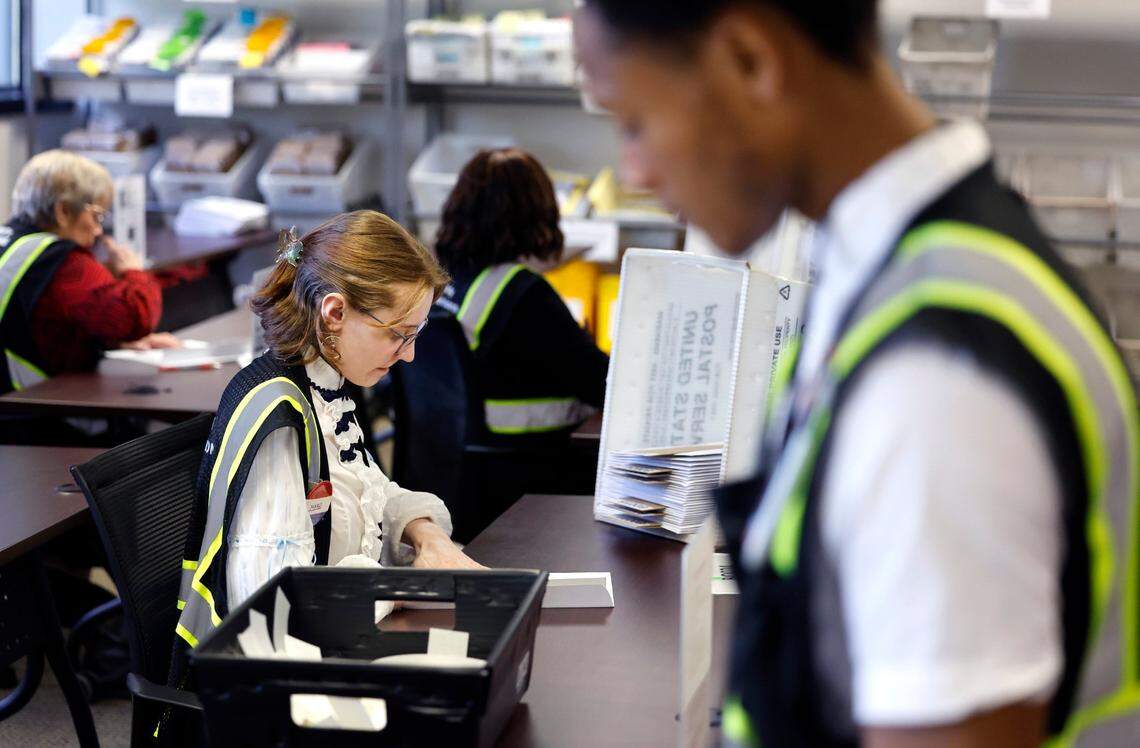 Absentee ballots are prepared to be sent out at the Wake County Board of Elections Operations Center in Raleigh, N.C., Tuesday, Oct. 8, 2024.