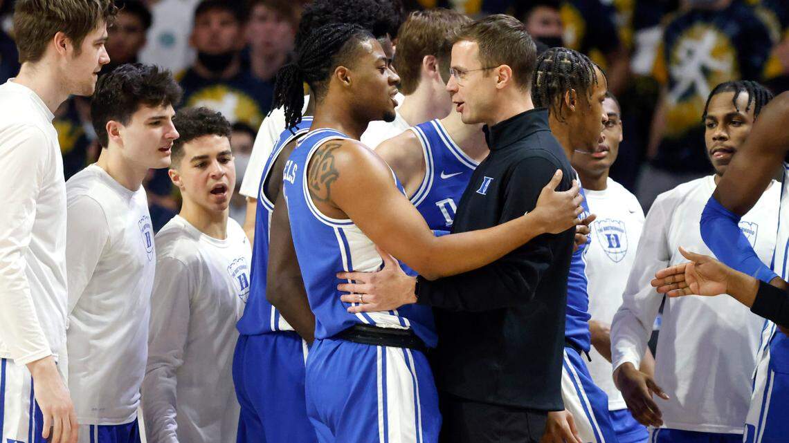Duke associate head coach Jon Scheyer talks with Trevor Keels (1) during the first half of Duke’s game against Wake Forest at LJVM Coliseum in Winston-Salem, N.C., Wednesday, January 12, 2022.