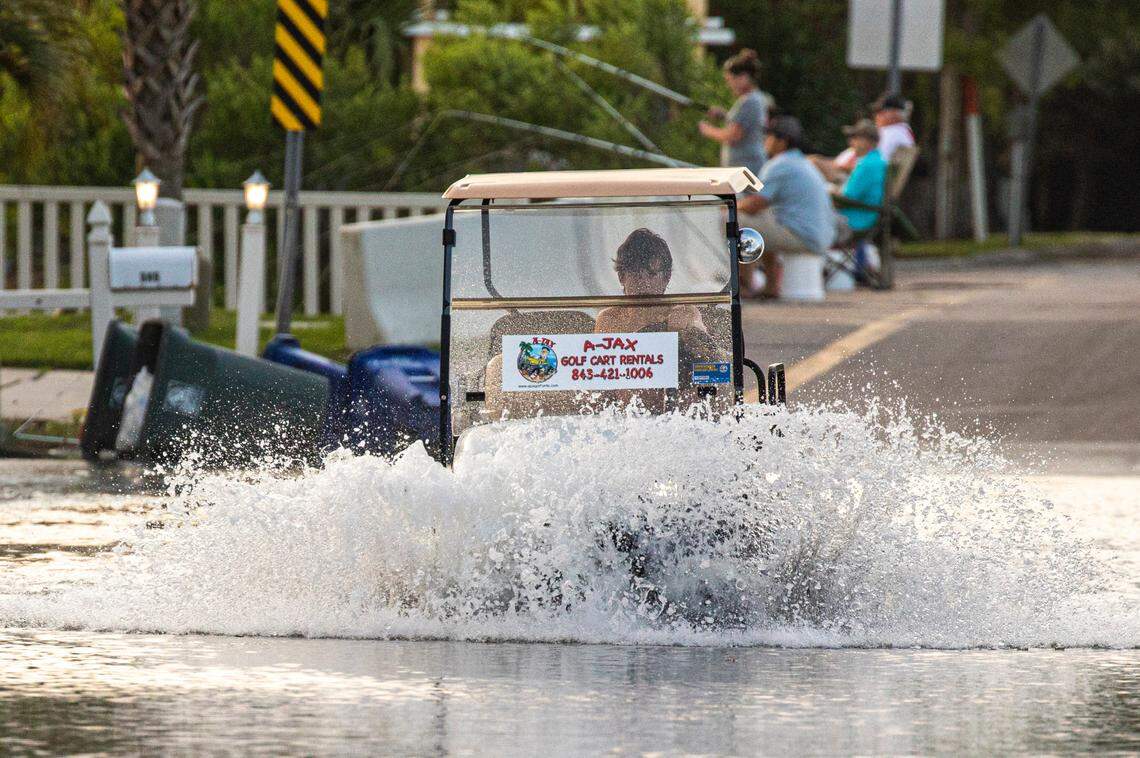 Streets flood during King Tides Cherry Grove section of North Myrtle Beach. Aug. 11, 2021.