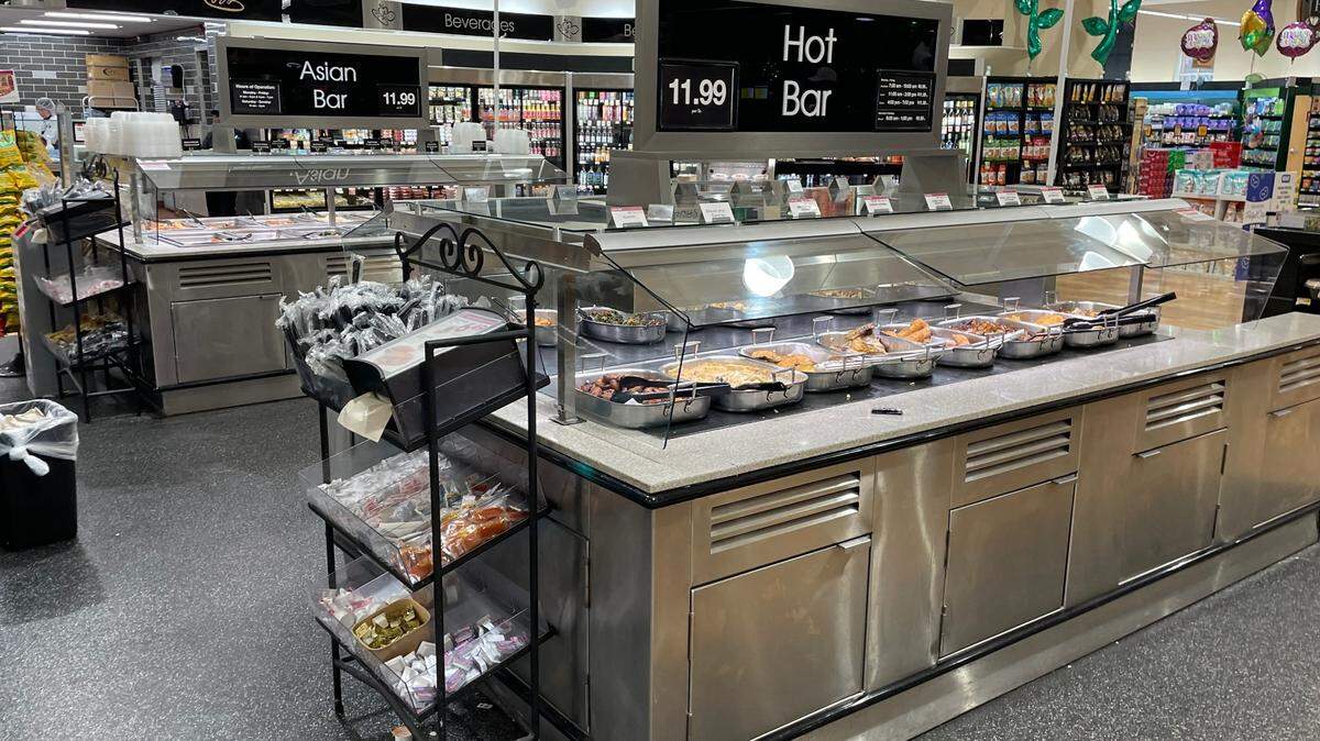 Two popular North Carolina grocery stores have beer and wine bars.