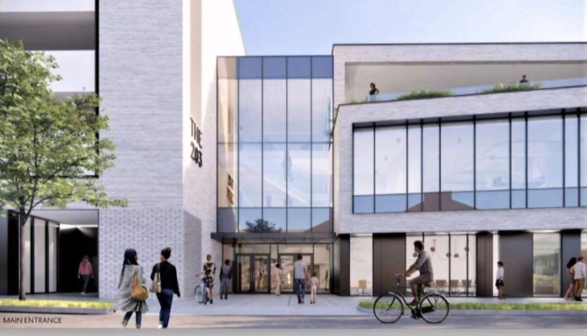 The main entrance to the new building would be located on Roberson Street, across the street from Open Eye Cafe and other downtown businesses.