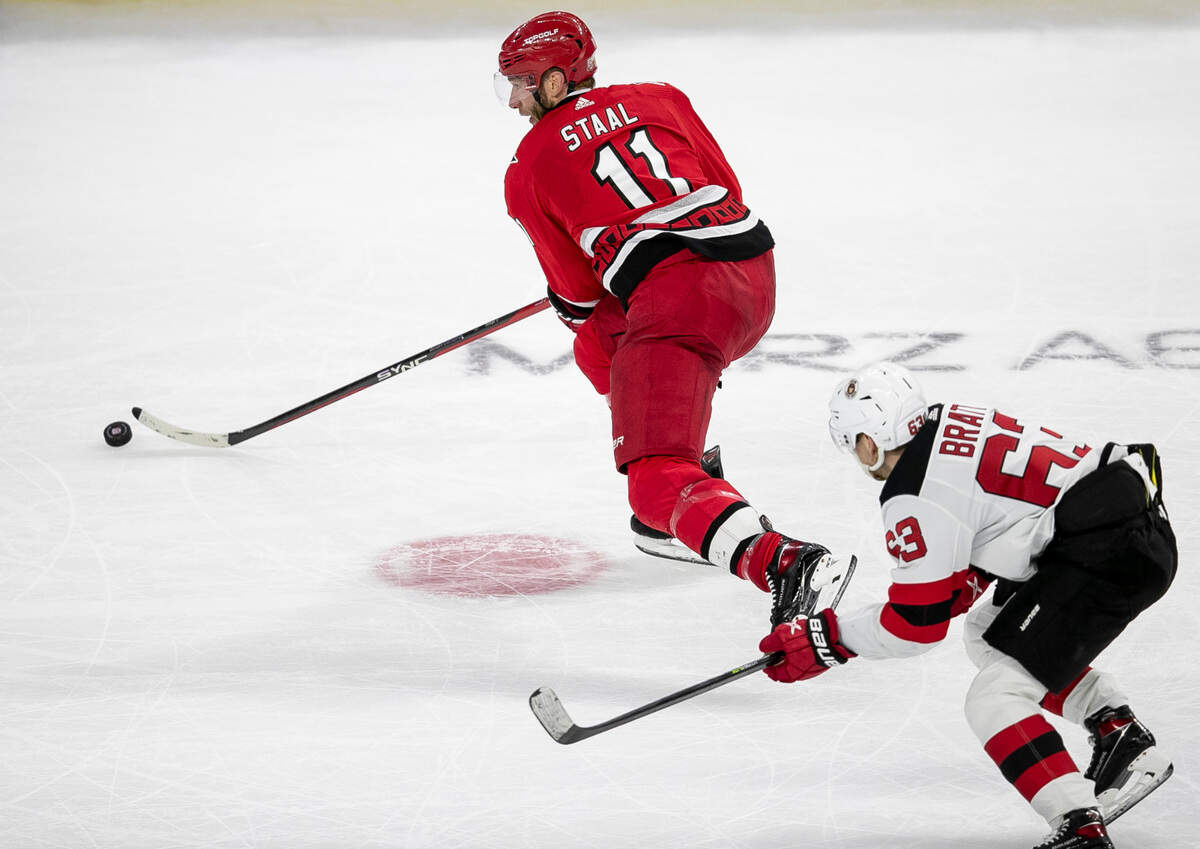 The Carolina Hurricanes Jordan Staal (11) breaks away from the New Jersey Devils Jesper Bratt (63) in the third period of Game 1 their second round Stanley Cup playoff series on Wednesday, May 3, 2023 at PNC Arena in Raleigh, N.C.
