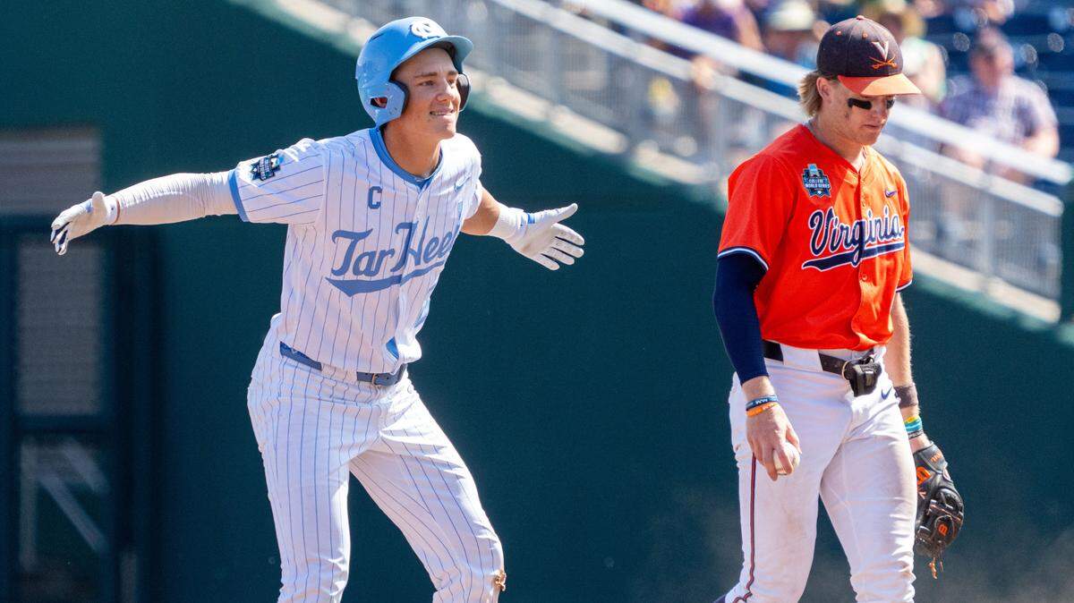 Jun 14, 2024; Omaha, NE, USA; North Carolina Tar Heels infielder Jackson Van De Brake (6) celebrates after hitting a double during the ninth inning against the Virginia Cavaliers at Charles Schwab Field in Omaha.