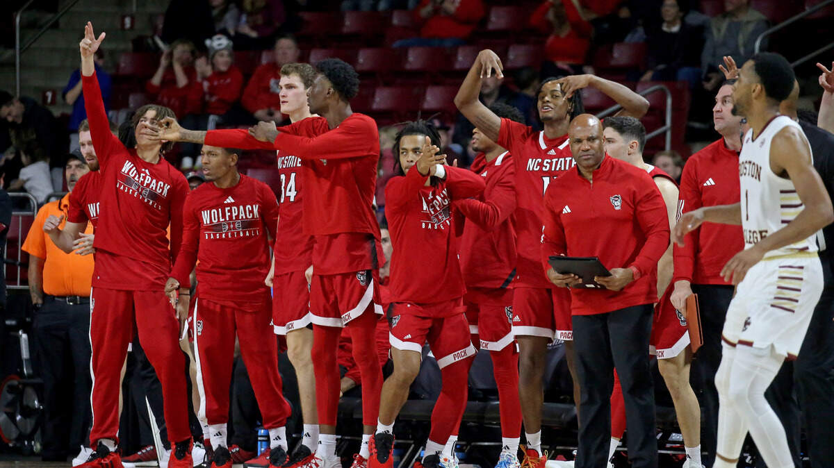 Boston, MA-  North Carolina State Wolfpack celebrates a bucket as Boston College takes on NC State in basketball at Conte Forum on December 2. (Staff Photo By Stuart Cahill/Boston Herald) 