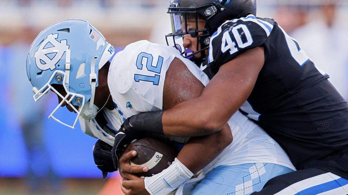 Duke’s Ryan Smith sacks North Carolina quarterback Jacolby Criswell during the second half of the Blue Devils’ 21-20 win on Saturday, Sept. 28, 2024, at Wallace Wade Stadium in Durham, N.C.