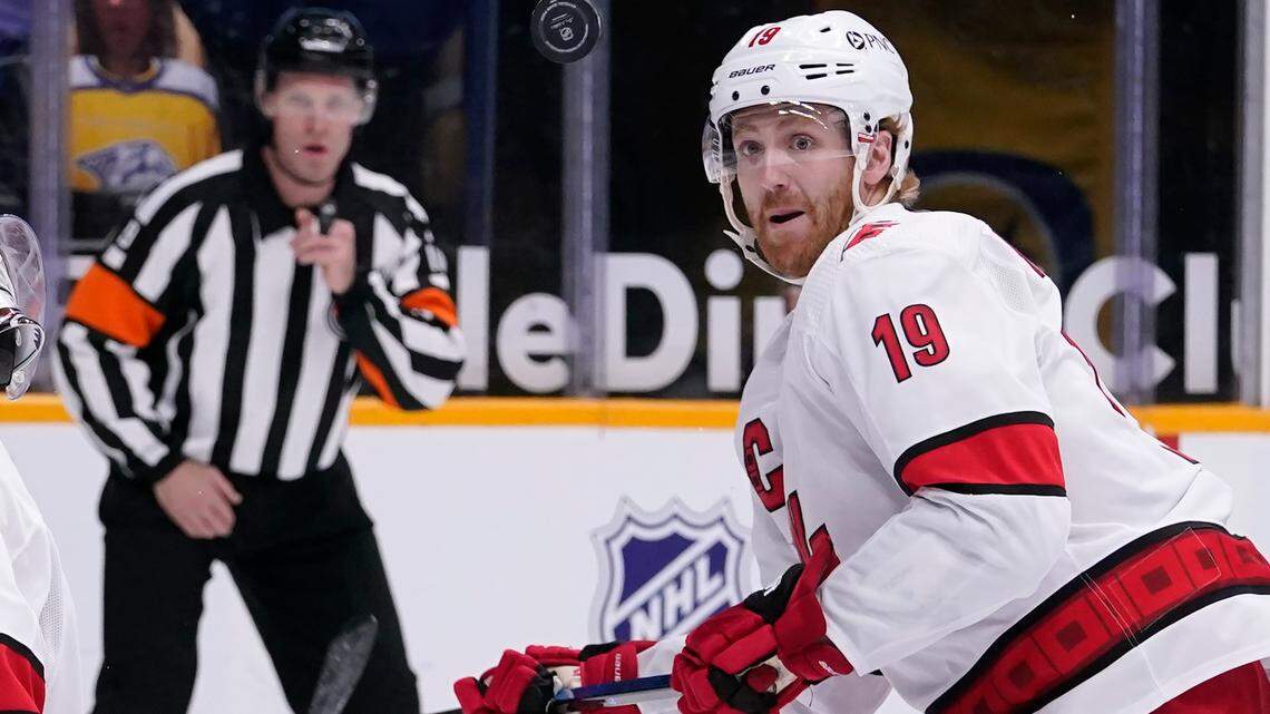 Carolina Hurricanes defenseman Dougie Hamilton (19) follows the bouncing puck in the second period of an NHL hockey game against the Nashville Predators Tuesday, March 2, 2021, in Nashville, Tenn. (AP Photo/Mark Humphrey)